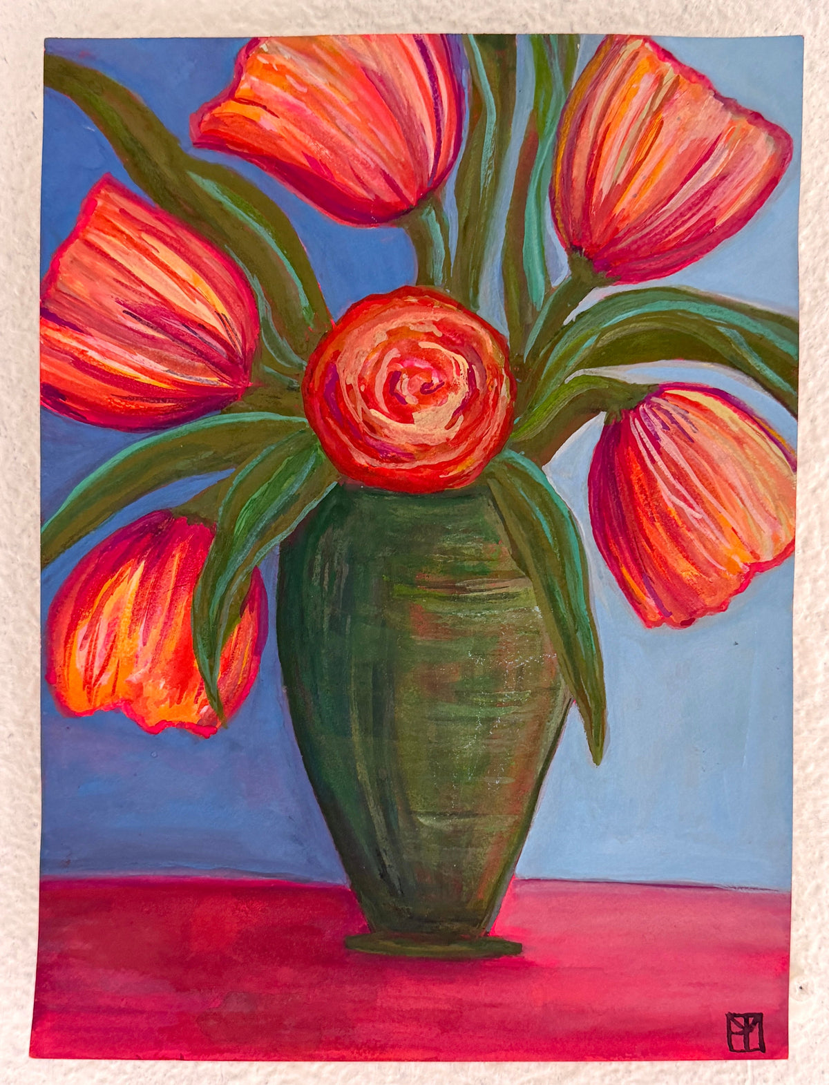 A vertical painting of vibrant red and orange tulips in a dark green vase against a blue background