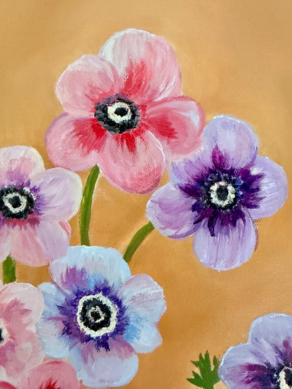 A close-up painting of anemone flowers with pink, lavender, and light blue petals, dark purple centers, and green stems on a warm tan background.