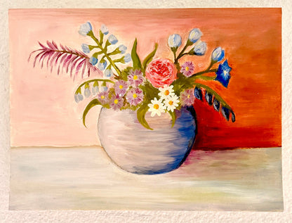 A square hand-painted still life artwork of a floral bouquet in a blue-gray vase, displayed on a textured off-white wall. The painting features a pink and orange gradient background, with a bouquet of white, pink, purple, and blue flowers with green leaves.