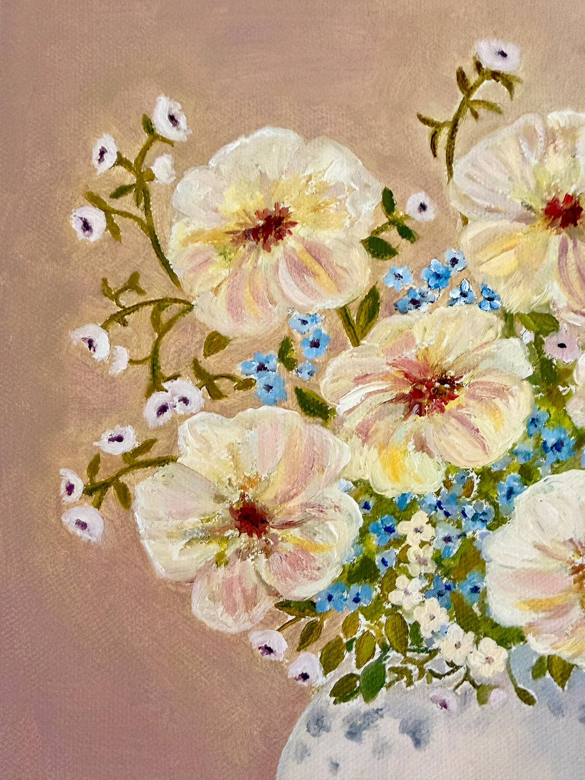 An oil painting of a floral bouquet featuring large cream and pale pink flowers, small blue flowers, and green leaves on a warm brown background.